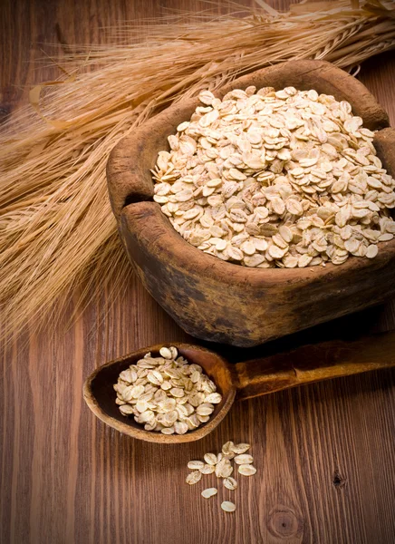 Oatmeal in spoon — Stock Photo, Image