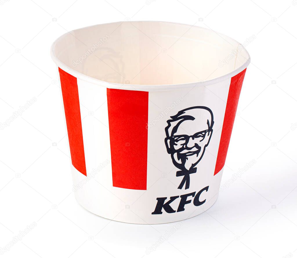 Chisinau, Moldova September 01, 2021: A Bucket of KFC Chicken. Initially Kentucky Fried Chicken, founded by Harland Sanders, the fast food restaurant chain is now owned by Yum! Brands.