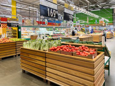 Novorossiysk, Russia - April 27, 2022: trading floor fruit and vegetable sales department in the supermarket. 