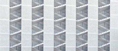 Abstract staircases of a modern office building. Modern corporate business architecture. Black and white image