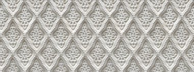 patterns on a white stone background