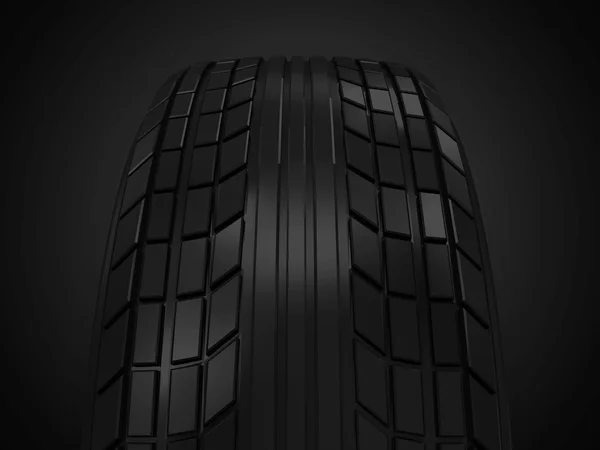 Auto pneumatiky na tmavém pozadí — Stock fotografie