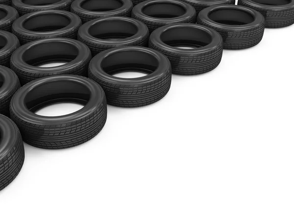 Neumáticos de coche aislados sobre fondo blanco con lugar para su texto — Foto de Stock