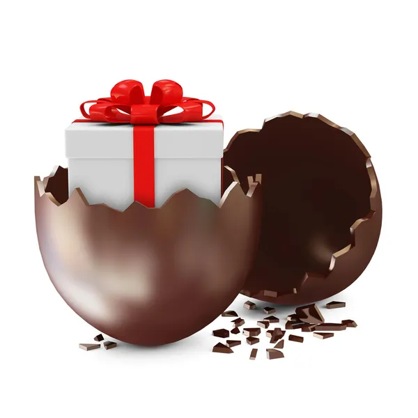 Broken Chocolate Easter Egg with Gift Box Inside over white background Royalty Free Stock Images
