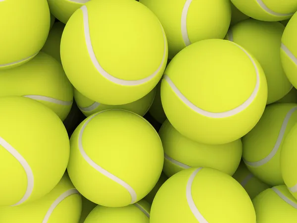 Högen av tennisbollar isolerad på vit bakgrund — Stockfoto
