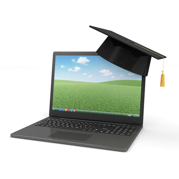 Computadora portátil moderna con casquillo de graduación —  Fotos de Stock