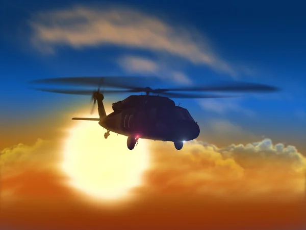Helicóptero volando desde el atardecer — Foto de Stock