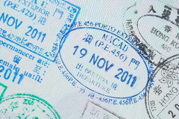 Visa stamps in passport — Stock Photo, Image