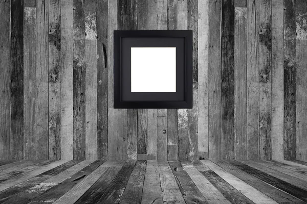 Picture frame on the old wooden wall — Stock Photo, Image