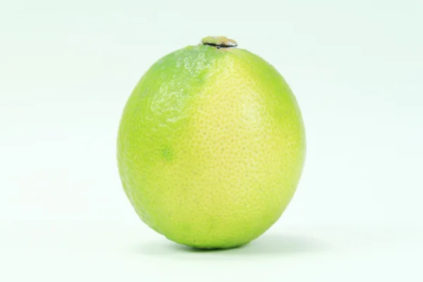 Fresh limes on white — Stock Photo, Image