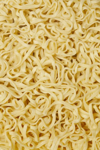 Dried instant noodles as a background — Stock Photo, Image