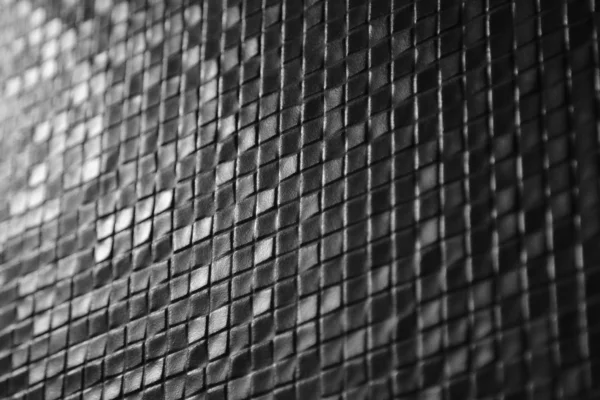 Carreaux foncés motif mosaïque sur un mur — Photo