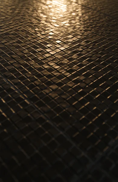 Dark tiles mosaic pattern on a wall — Stock Photo, Image