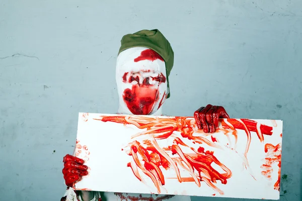 Scary bloody zombie blind in cap — Stock Photo, Image