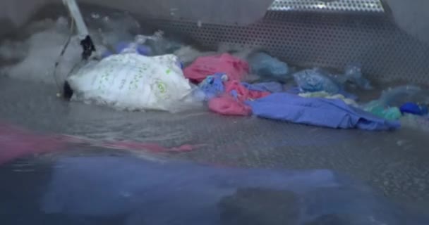 Waste water treatment from garbage.water is purified from debris by special industrial equipment.close-up — Stock Video