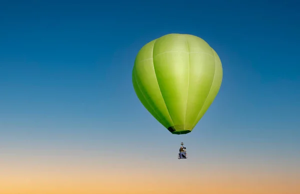 Green Hot Air Balloon Flight Stock Image
