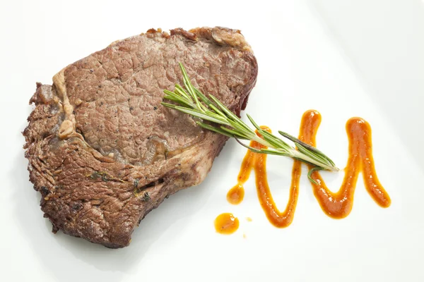 Grilled Sirloin steak with rosemary — Stock Photo, Image