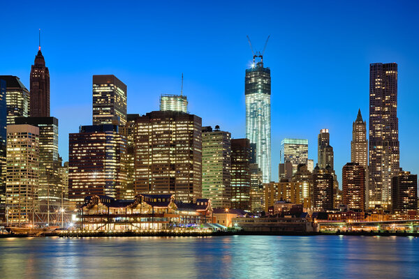 New York City skyline at twilight w the Freedom tower