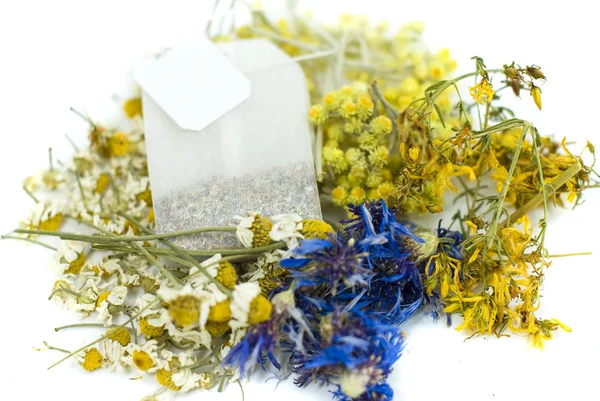 Tea bag from mix herbs,cornflower,hypericum,immortele,and chamomile — Stock Photo, Image