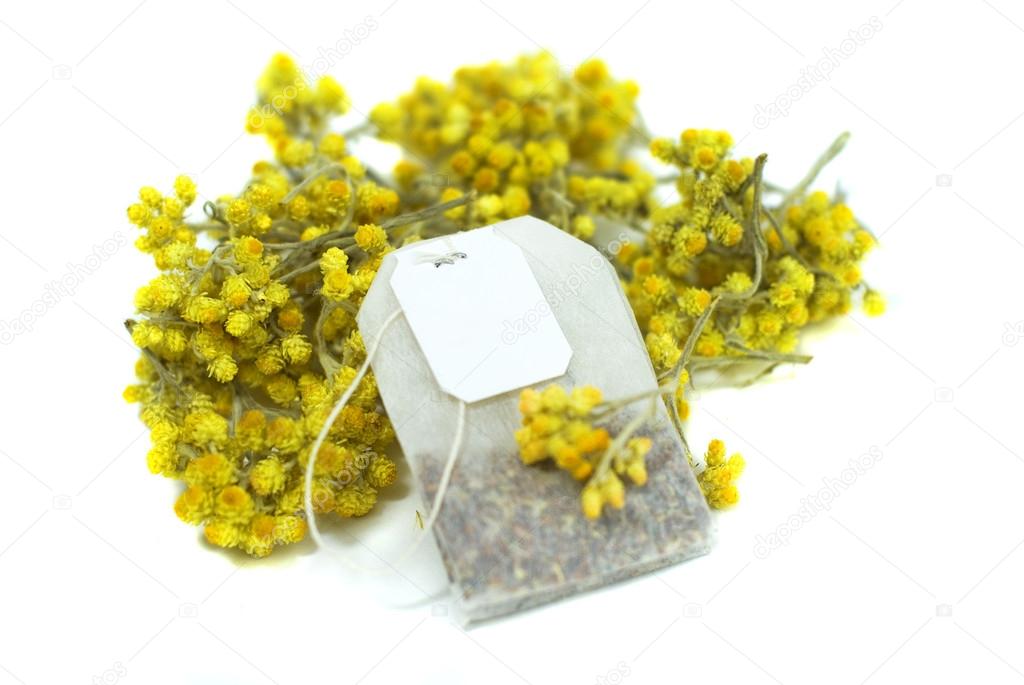 Tea bag from immortelle on white background