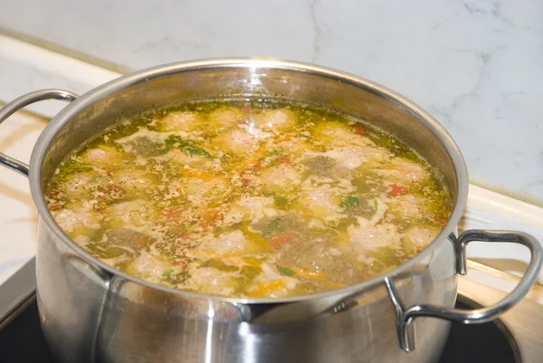 Soup with meatballs in pan — Stock Photo, Image