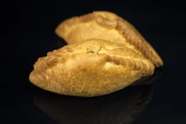 RUSSIAN PIES ON BLACK BACKGROUND — Stock Photo, Image