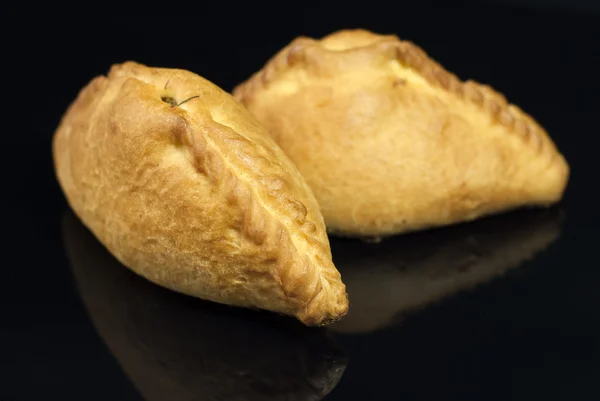 RUSSIAN PIES ON BLACK BACKGROUND — Stock Photo, Image