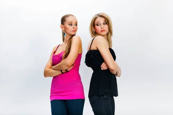 Two young women in conflict Stock Photo