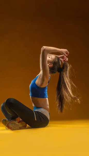 Fit Woman Stretching Warming Isolated Yellow Background — Stok Foto