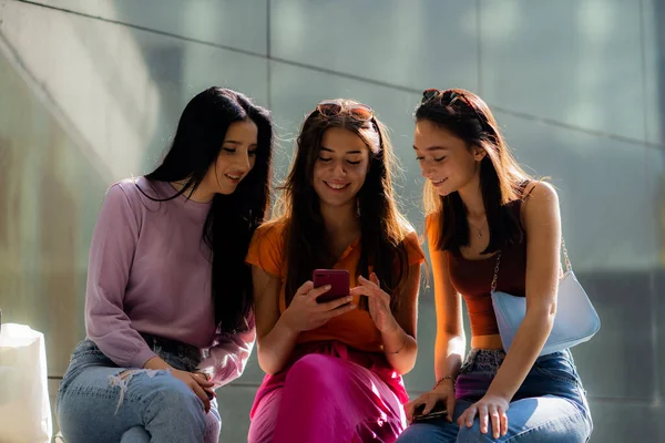 Three Attractive Beautiful Girl Friends Smiling Something Phone While Sitting — Stock Photo, Image