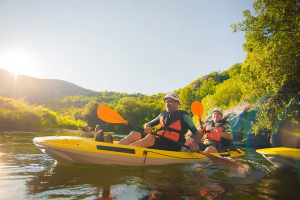 Two Senior Male Kayakers Trying Get Back Group While Kayaking — Stock Photo, Image