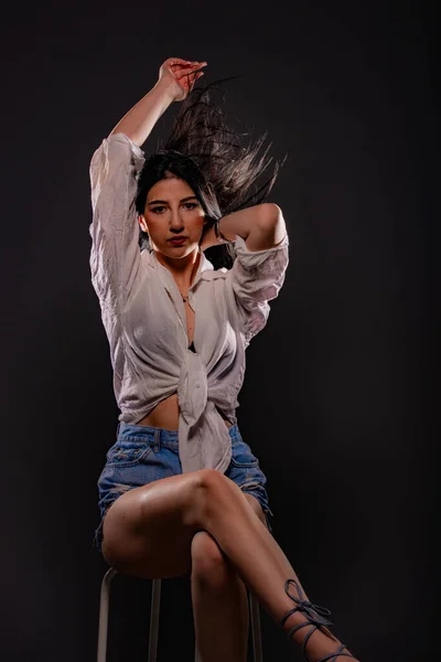 Attractive Beautiful Girl Posing Sitting Chair Studio While Playing Her — Stock Photo, Image