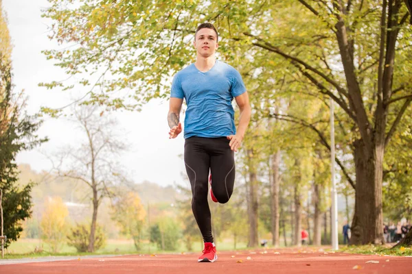 Attractive Handsome Strong Guy Stopping His Running — Stockfoto