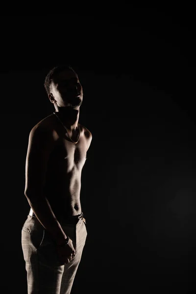 Young Black Male Topless While Posing Dark Background Silhouette — Foto Stock