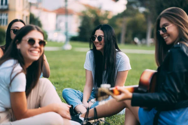 Beautiful Adorable Girls Smiling Sitting Grass Hile Playing Guitar — Foto Stock