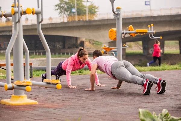 Amazing Attractive Strong Couple Exercising Together Ground River — Stock fotografie
