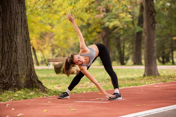 Attractive Beautiful Fit Girl Warming Stretching Alone Park Portrait — Stock Photo, Image