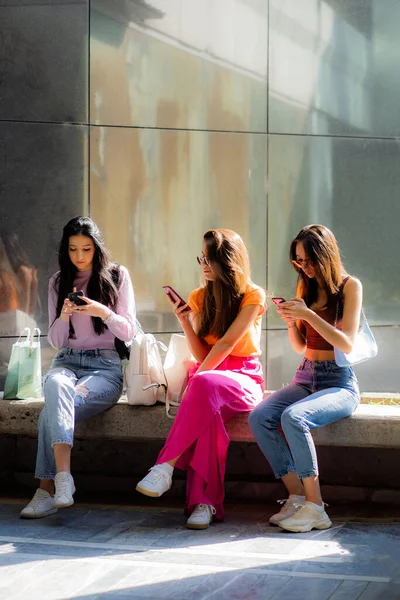 Three Amazing Attractive Girls Taking Break Shopping While Looking Phone — Stock Photo, Image