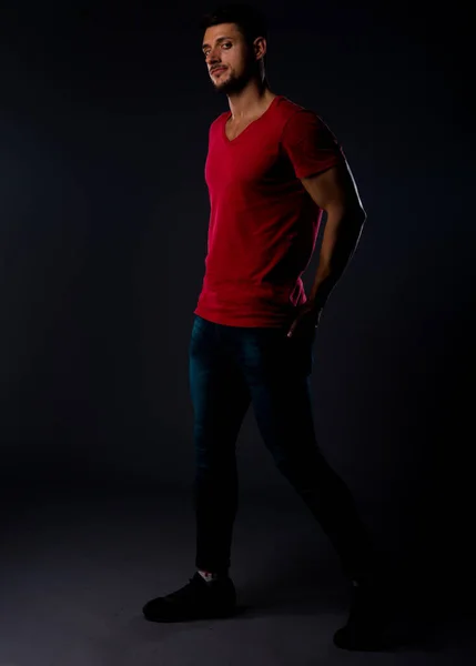 Trendy Handsome Man Posing Blue Denim Pants Red Top Sport — Fotografia de Stock