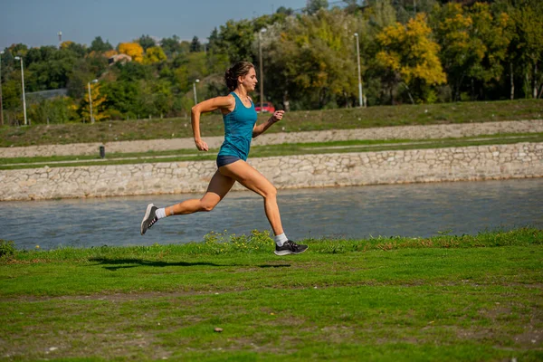 Attractive Beautful Fit Girl Running Fast Hard River — Stockfoto
