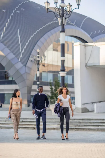 Three Multiracial Business People Walking All Together Being Happy — Stok fotoğraf