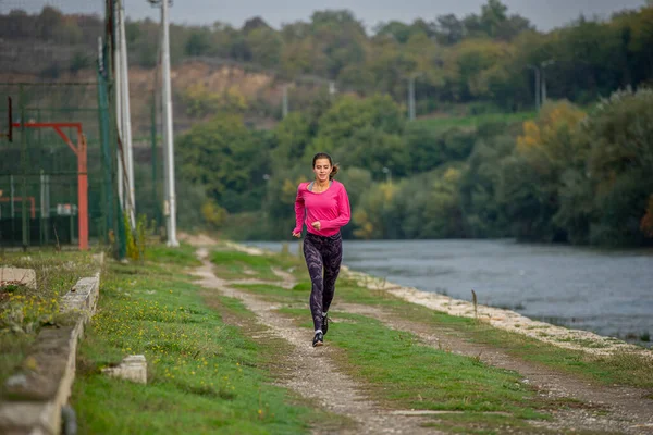 Attractive Beautiful Fit Girl Running Alone River Grass — Stockfoto