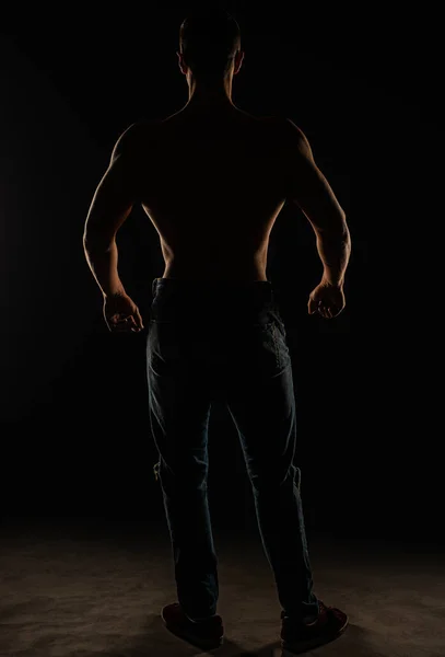 Silhouette Handsome Attractive Topless Guy Posing Back Studio While Flexing — Stock Photo, Image
