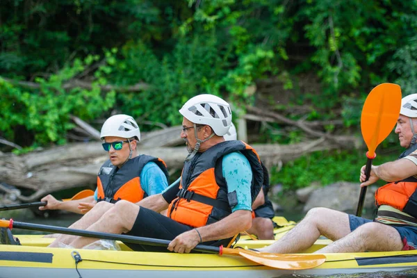 Portrait Senior Friends Talking Each Other While Being Kayak — Stock Photo, Image