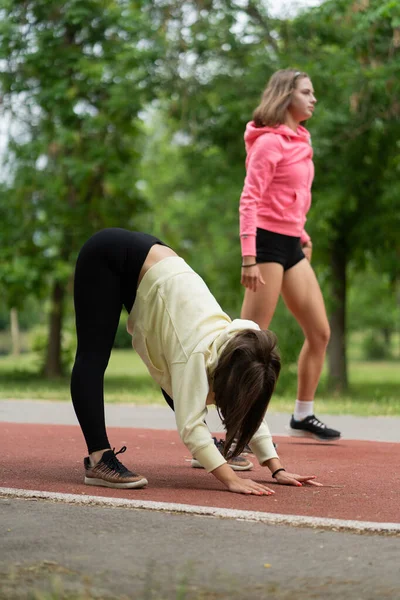 Two Young Attractive Girls Streching Training — Stock Photo, Image