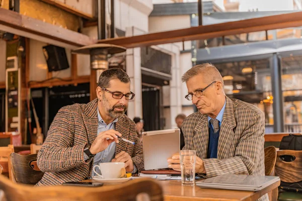 Two Senior Businessmen Thinking Lot Plans — Stock Photo, Image