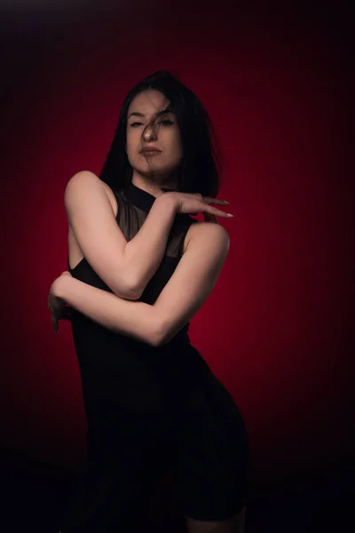 Seductive Woman Posing Red Background While Touching Herself Acting Sexy — Stock Photo, Image