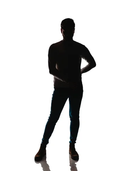 Portrét Pohledného Mladíka Černých Džínových Kalhotách Černý Svetr Izolovaný Bílém — Stock fotografie