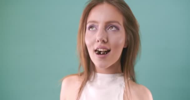 Close Portrait Cute Beautiful Girl Dancing Eating Chocolate Balls — Stock Video