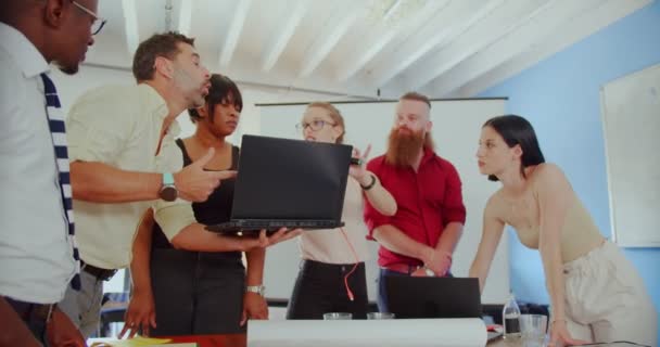 Group Multiracial Business People Looking New Plan Laptop While Discussing Stock Footage